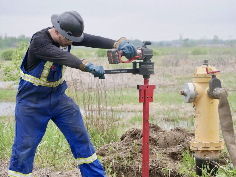 Cam-Trac Inspection Services crew performing hydrant rod repair work